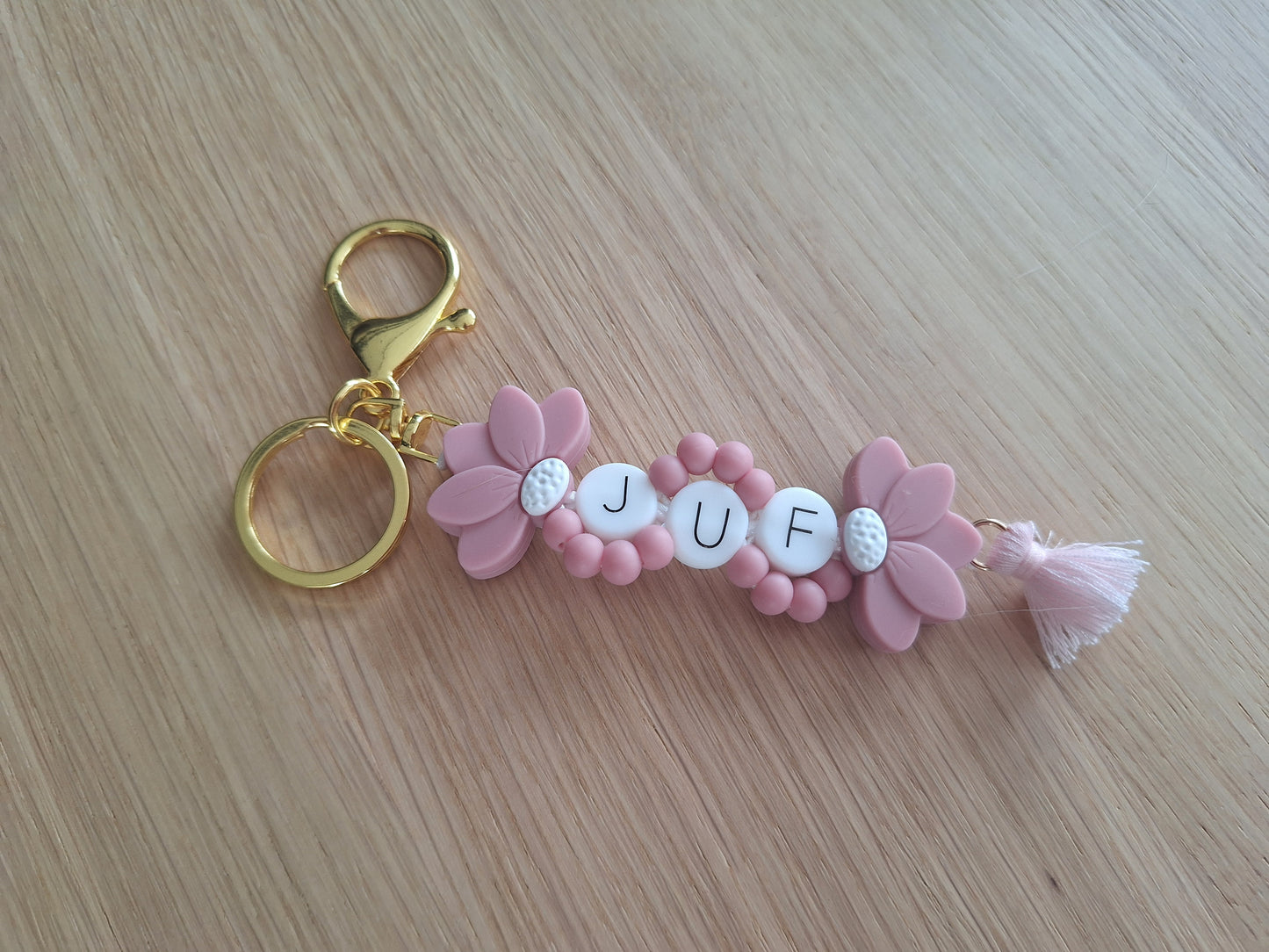 Sleutelhanger met halve bloem
