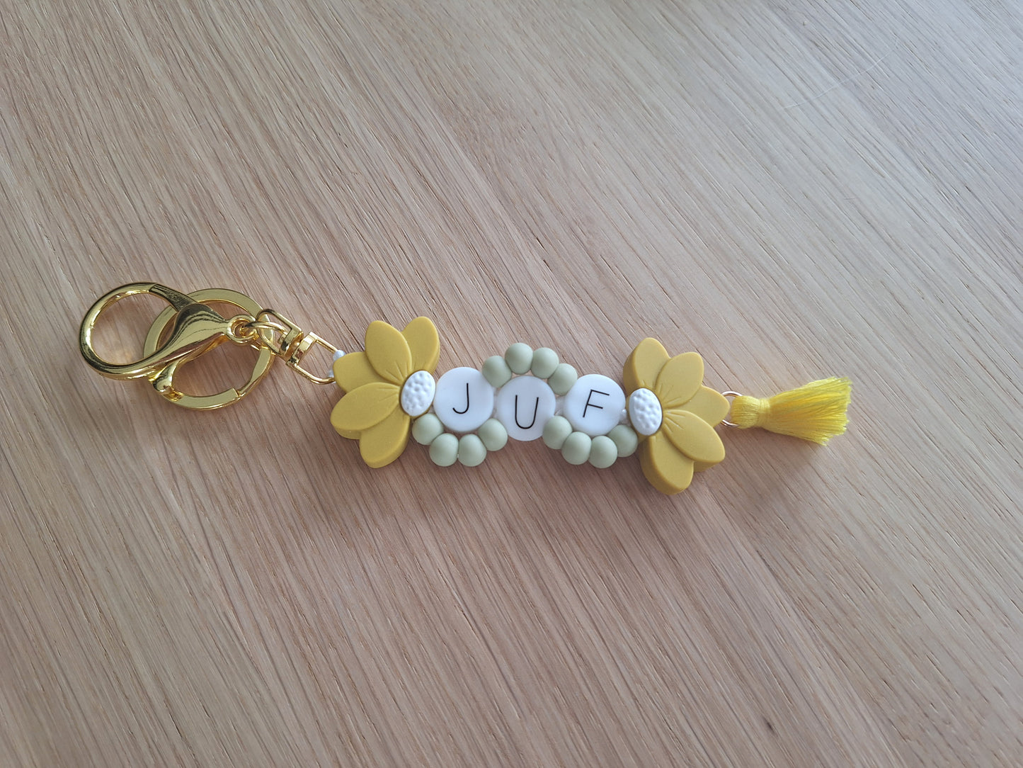 Sleutelhanger met halve bloem