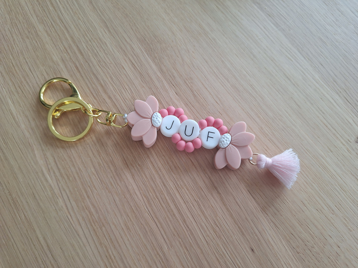 Sleutelhanger met halve bloem