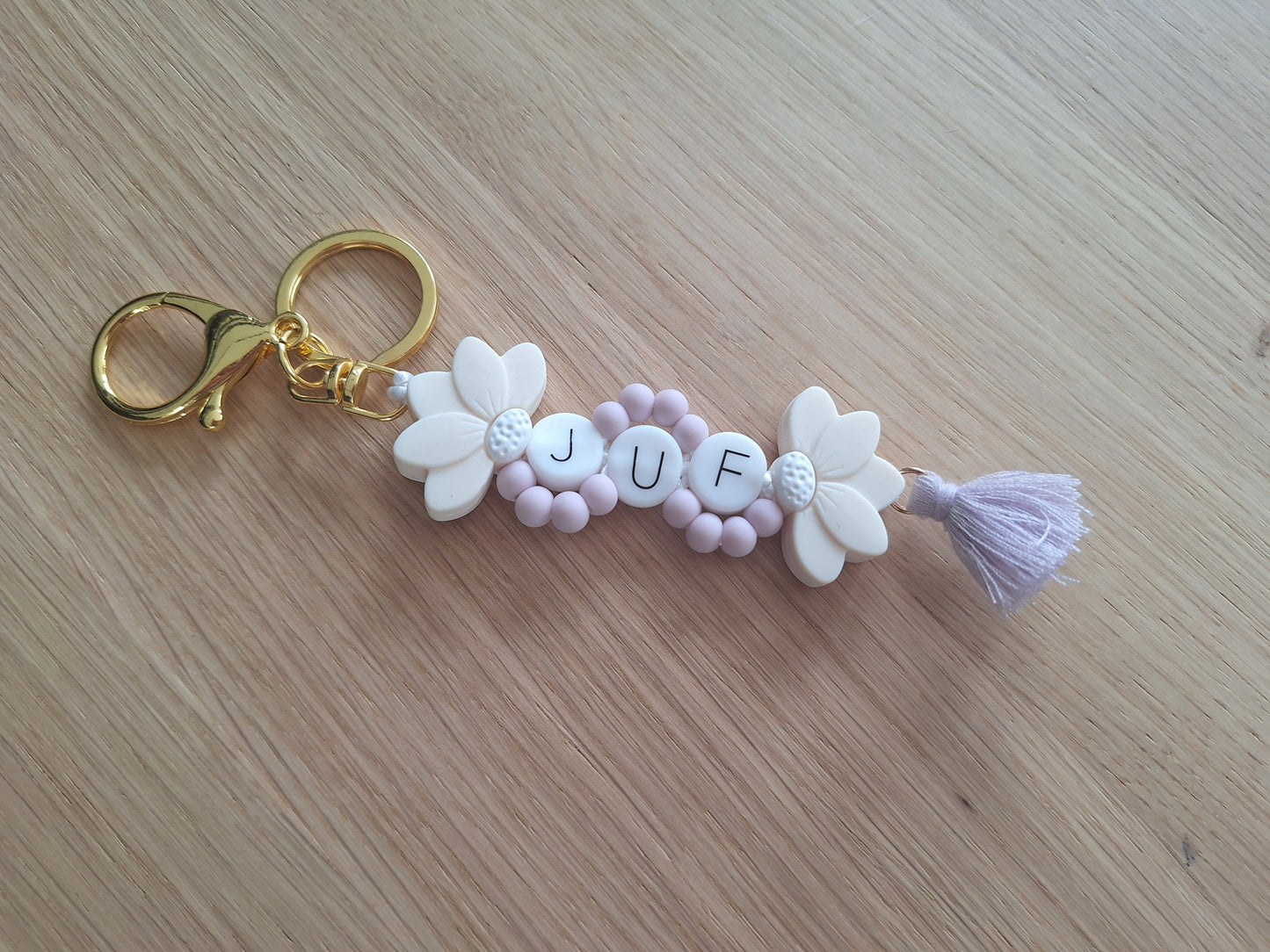 Sleutelhanger met halve bloem
